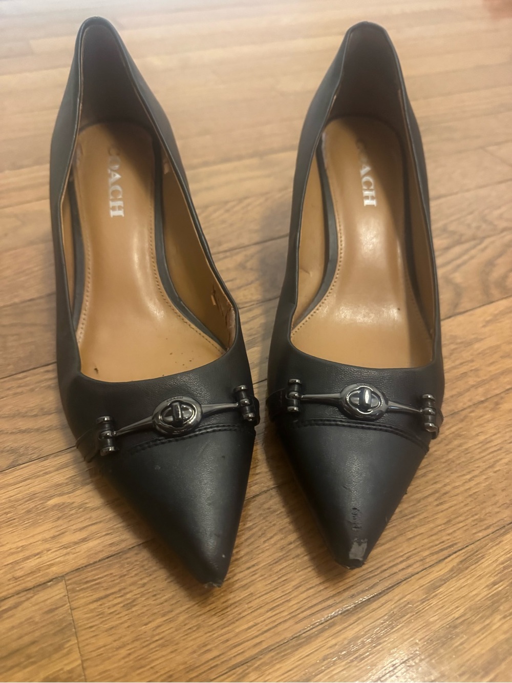 Coach Black Pointed Leather Pumps with Turn-Lock Accent Hardware